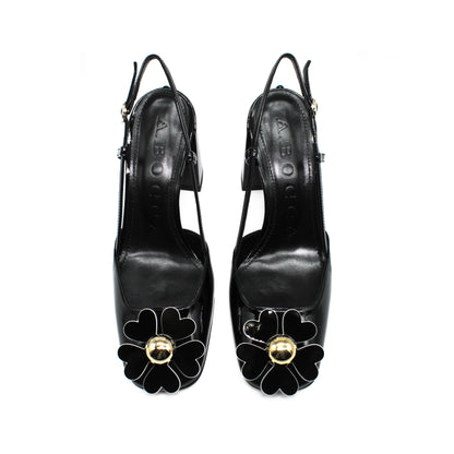 Sling back with maxi-flower in black patent leather h.75